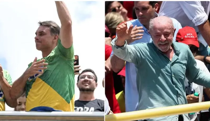 Flávio Bolsonaro e Lula neste sábado (24). — Foto: AFP/Reuters